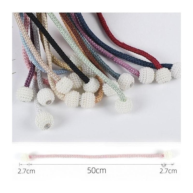 Conjunto de 2 prendedores de cortina magnéticos estilo boho chic com detalhes em pérola artificial.