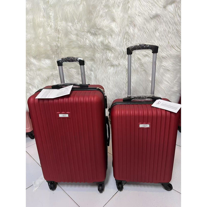 Mala de viagem grande com rodas giratórias 360°, feita de polipropileno.