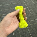 Brinquedo para cães em formato de osso com estampa de bolinhas - Cabo de borracha resistente para escovação.