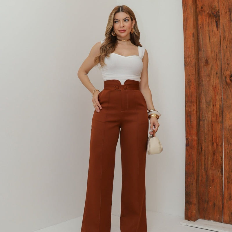 Calça social feminina moderna e elegante com botão e bolso frontal.