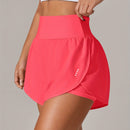 Shorts de ioga femininos de secagem rápida com bolso de tela.