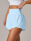 Shorts de ioga femininos de secagem rápida com bolso de tela.