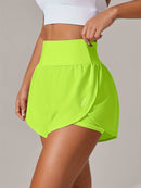 Shorts de ioga femininos de secagem rápida com bolso de tela.
