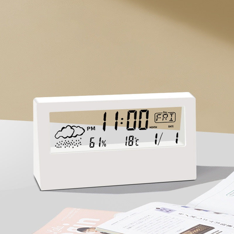 Relógio de mesa digital multifuncional com visor LCD para temperatura e umidade.
