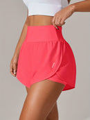 Shorts de ioga femininos de secagem rápida com bolso de tela.
