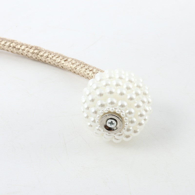 Conjunto de 2 prendedores de cortina magnéticos estilo boho chic com detalhes em pérola artificial.