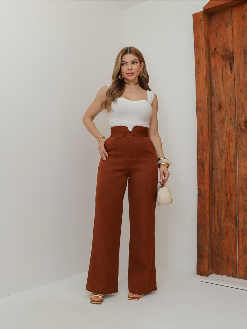 Calça social feminina moderna e elegante com botão e bolso frontal.