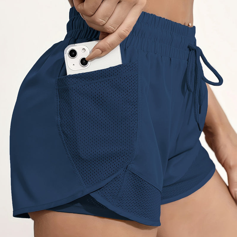 Shorts de ioga femininos de secagem rápida com bolso de tela.