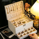 Caixa de joias de três níveis à prova de poeira com trava.