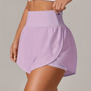 Shorts de ioga femininos de secagem rápida com bolso de tela.