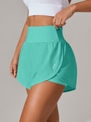 Shorts de ioga femininos de secagem rápida com bolso de tela.