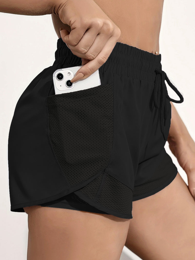 Shorts de ioga femininos de secagem rápida com bolso de tela.