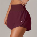 Shorts de ioga femininos de secagem rápida com bolso de tela.