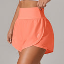 Shorts de ioga femininos de secagem rápida com bolso de tela.