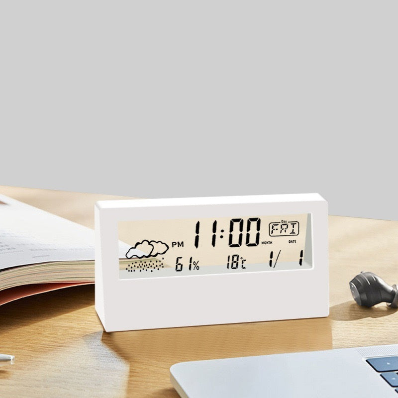 Relógio de mesa digital multifuncional com visor LCD para temperatura e umidade.